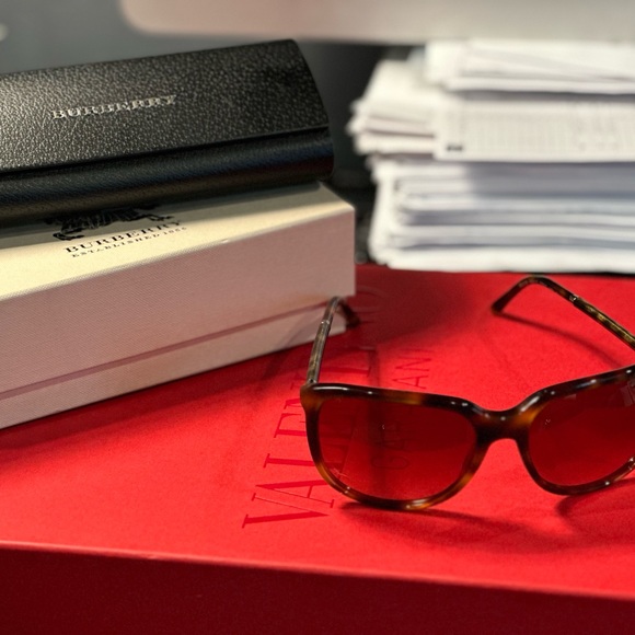 Burberry sunglasses.  Wore 1-3 times only.  Comes with case and box.  Almost new - Picture 2 of 3